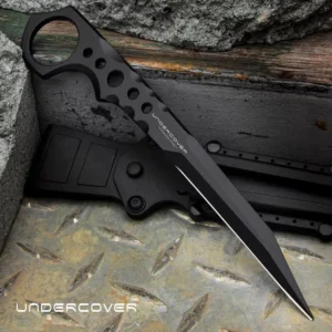 Фиксированный скрытный нож Undercover CIA Stinger II BO‑02UC3513, клон United Cutlery, цельнометаллический 3Cr13 клинок 3,5″ (~89 мм) в черном матовом покрытии, рукоять из цельной стали с отверстиями и кольцом у эфеса, нейлоновые ножны с быстросъемной кли